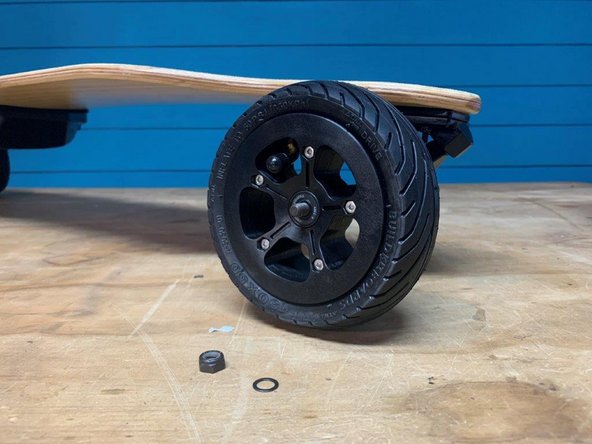 Place a wheel on the truck with the stem facing outwards