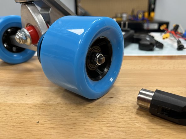 Place the locknut onto the hanger and tighten using the T-Tool