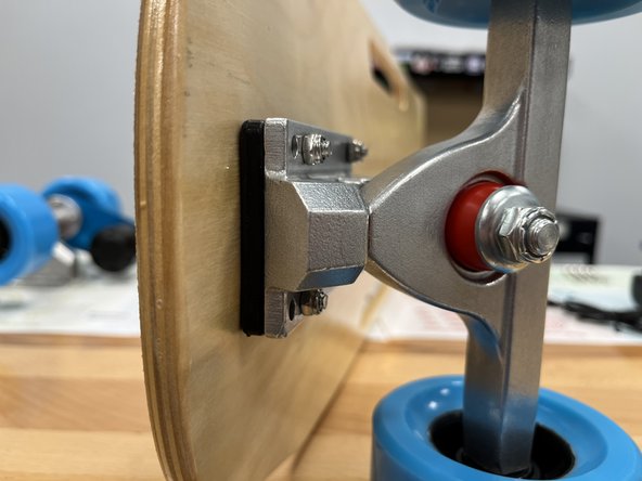 Tighten all 4 locknuts to secure the truck