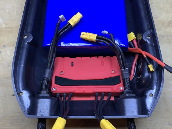 Install the charge port and switch onto the enclosure