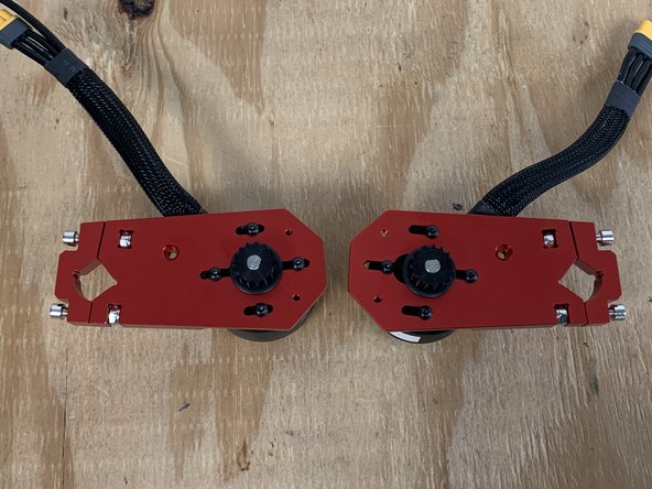 Repeat this process to install the motor pulley on the other motor