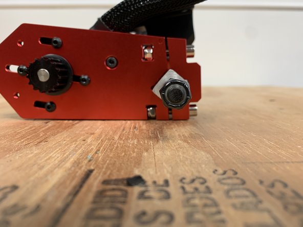 Align the motor mount assembly to the center of the truck. There should be even spacing on both sides of the truck