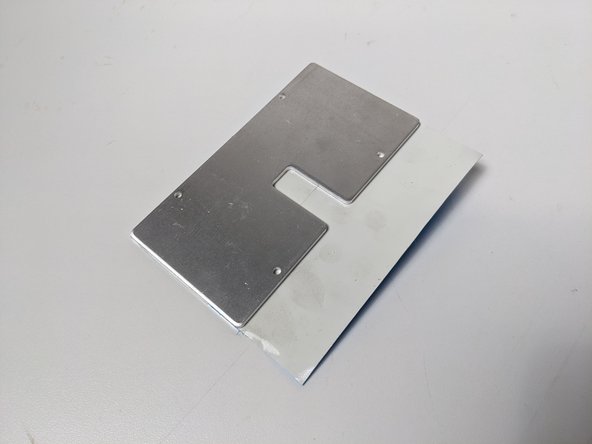 Trim the excess thermal tape and place aside (you can use the excess later if you're careful)