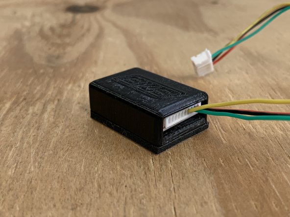 Place the receiver inside the 3d printed housing. UPDATE: We now provide shrink wrap instead of the 3D printed housing.