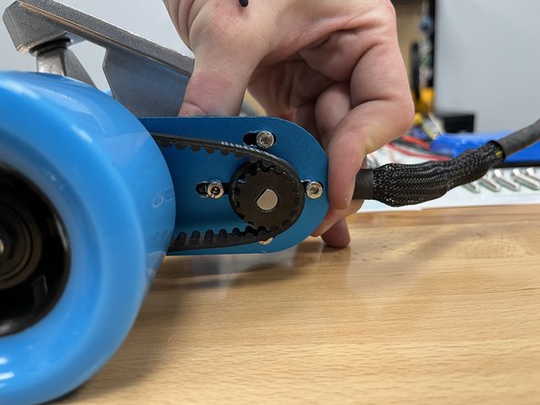 Now its time to tension the belt! Pull back (or to the right) on the motor to apply tension to the belt