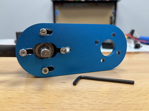 Install the other three bolts, do NOT tighten them fully