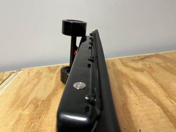 The order of components should be as follows: bolt, deck, enclosure, rubber washer, metal washer, locknut