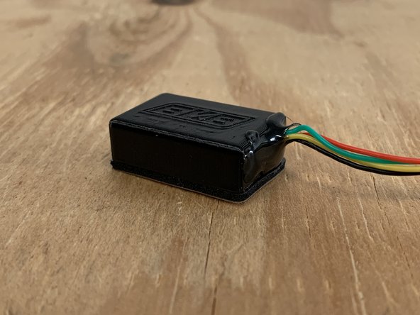 Fill the gap with hot glue, and secure the connection from the cable to the plug with the hot glue.