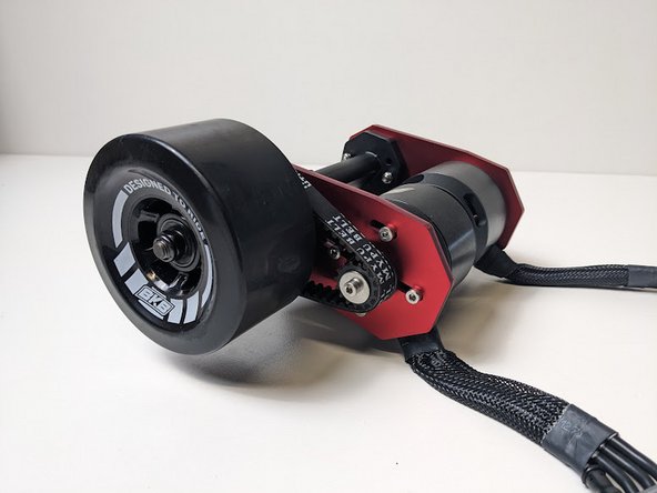 Add the washer and locknut back onto the truck. Tighten with the T Tool