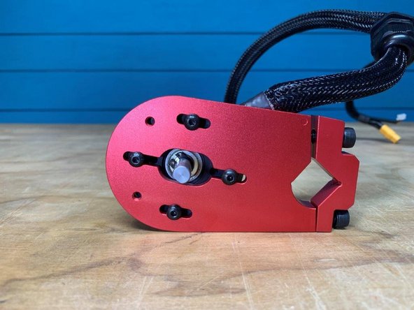 Place 3-4 drops of loctite on each bolt and fasten the motor mount and motor together