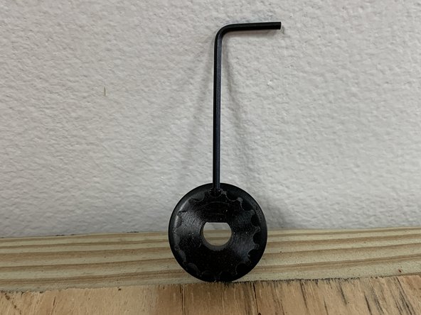 Gather the motor pulleys, 2mm Allen wrench, and Loctite