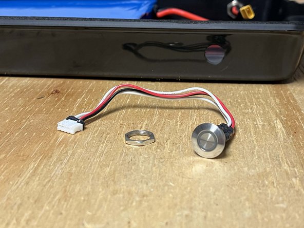 Remove the locknut from the switch