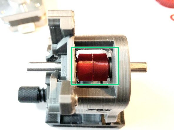 Pass Bondtech end of shaft through front bearing.