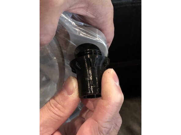 Screw in penetrator while keeping plastic lightly stretched flat.