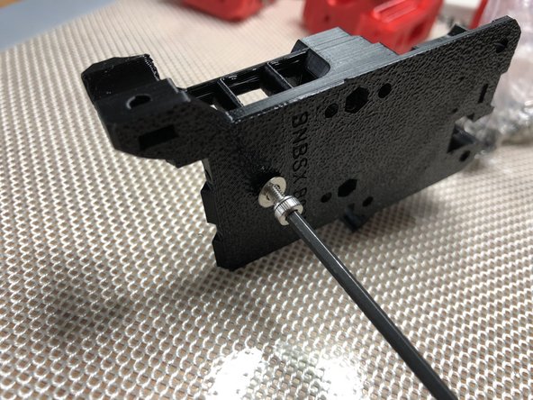 Be sure nut is rotationally aligned with hex recesss as you draw it in. Misalignment will damage the pocket.