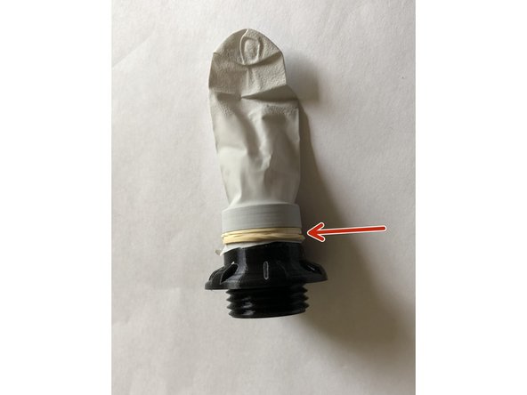 Cut one of the longer fingers from glove and stretch its open end over the Halo flutter valve fitting.