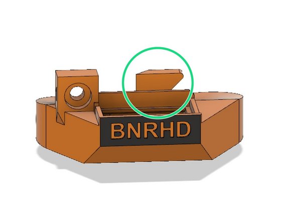 Fan shroud attached to hotend cover via single M3 x 10 mm screw.