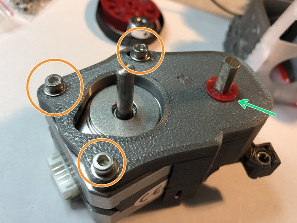 Insert motor into motor plate gearbox. Motor plate is notched and recessed for easy motor insertion. Do not secure the motor yet.