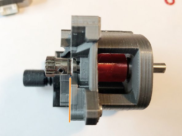 Put Bondtech drive on shaft. Align its set screw with flat and position so shaft extends about 0.25 mm beyond Bondtech.