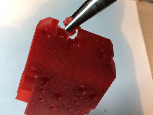 Score and remove breakaway tab from x-carriage to make it MK3S compatible