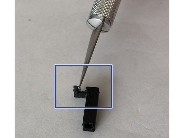 Use sharp blade and /or emory board to clean stringing from optical fin. Try not to alter fin dimensions during cleaning.