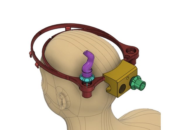 External Air Connector block attaches to halo via an M3 nut and bolt. A pair of 22 mm penetrators create inspiratory port for incoming, clean air. Surgical mask should also be worn.
