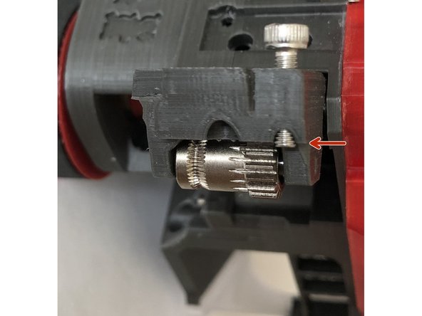 When filament sensor adjust screw is correctly set, it minimally extends beyond idler door. This picture show how little it will extend after calibration. For now, leave its tip flush with idler door inside surface.