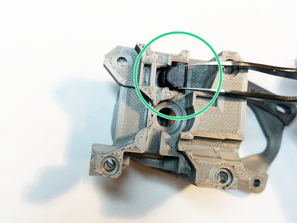 When the internal sensor lever is in use, no armature bearing prevents filament exiting the opening formerly occupied by the armature bearing. Installing a filament path insert closes that hole.