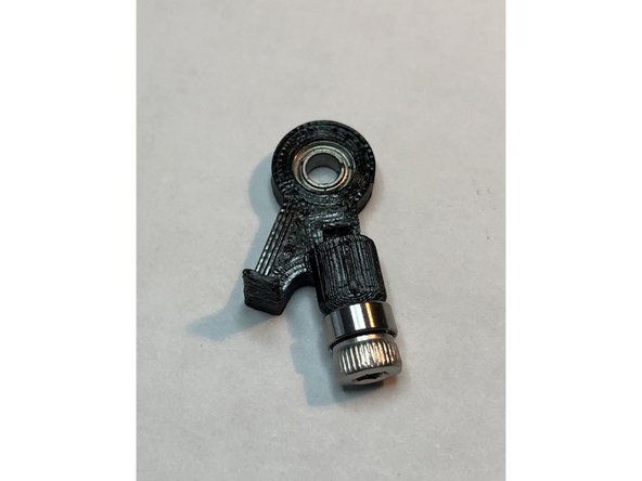 Top of armature's bearing mount is smaller diameter. Do not press bearing in from top. Be careful not to break the interruptor fin.