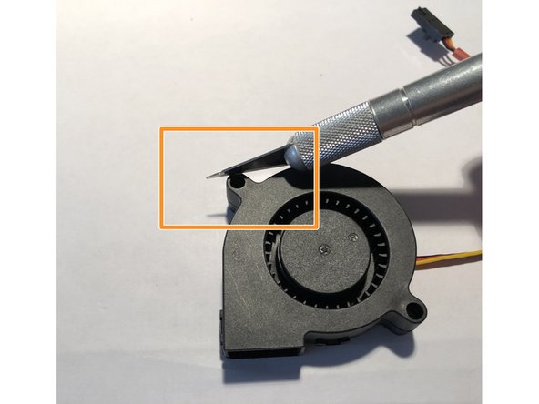 Fan's top mounting tab will impinge belt path due to unavoidable tight spacing. Bunnies could not alter this spacing without breaking important spatial relationships.