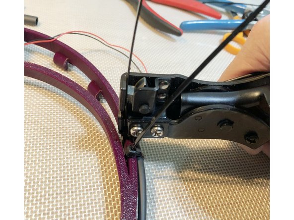 Zip tie cable to Halo. Secure the actual cable itself, not the shrink wrap or fan leads.