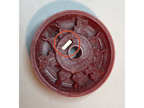 Embed M3S square nut and M3 x 4 mm set screw into pulley. Leave set screw out far enough to permit easy gear shaft passage.