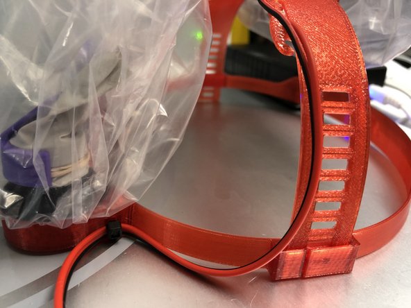 Flex Fit Bunny PAPR has zip tie channels molded into its expiratory port "ears."