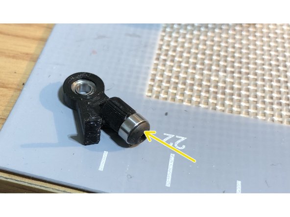 Press pivot MR63ZZ 3x6x2.5 mm miniature bearing into BOTTOM of armature.