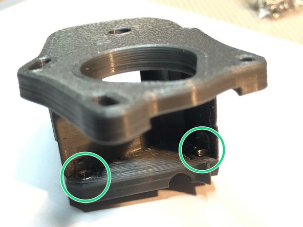 M3 Nylock for idler door bolt. We use Nylock here because idler door bolt is not secured under tension. It needs Nylock to help keep it in place.