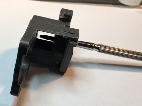 Support material inside and around bearing holes must be fully cleaned out. If necessary, pass a small, flat screwdriver in from opposite bearing hole to scrape things out.