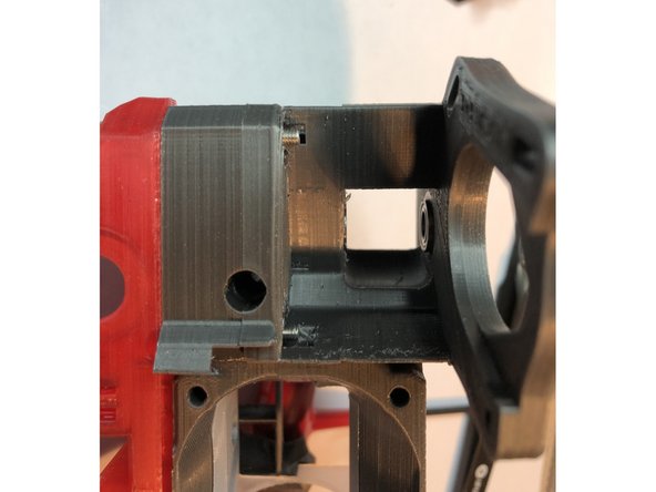 Lower center extruder body mounting screw can protrude into plenum. This is most problematic  if wider, Mosquito hot end is installed.