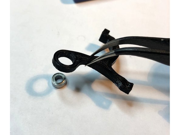 Press bearing into bottom of sensor lever.