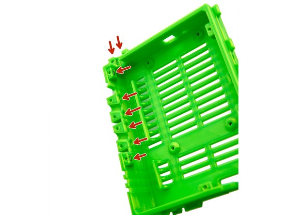 Slide 11x M3 Square Nuts into the slots provided on the inside of the Einsy Box.