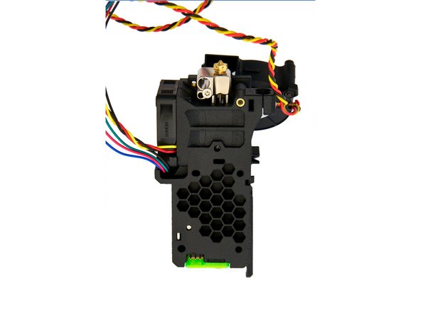 Legen Sie den x-Schlitten auf die Rückseite des Extruders.