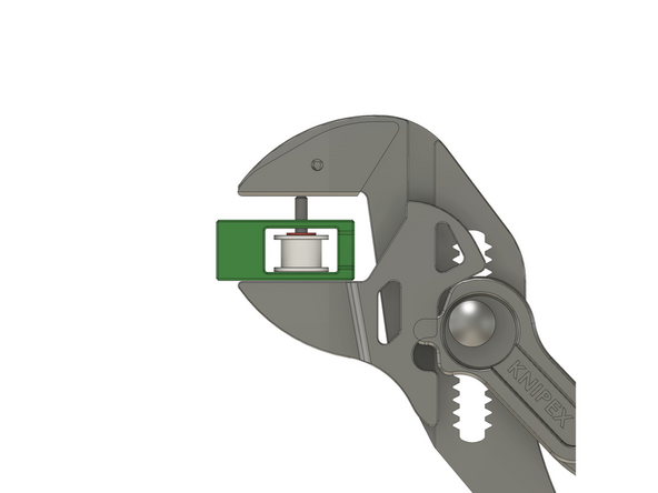 Stecken Sie nun eine zahnlose Riemenscheibe auf den Stift. Drücken Sie den Passstift weiter hindurch, bis er das Ende der zahnlosen Riemenscheibe erreicht.