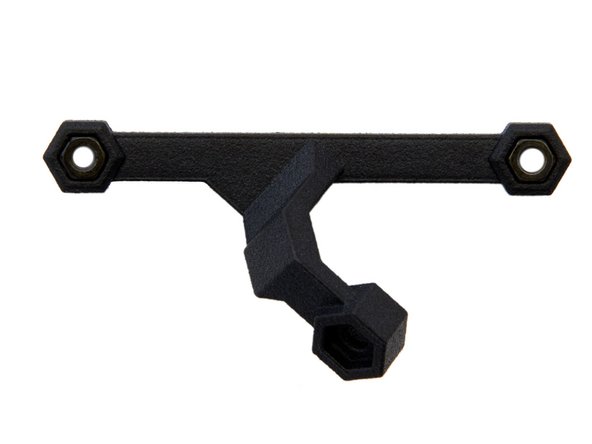 Insert 2x M3 Nuts into the fan holder.