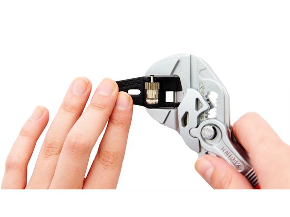 Carefully press the shaft into position with a pliers wrench.