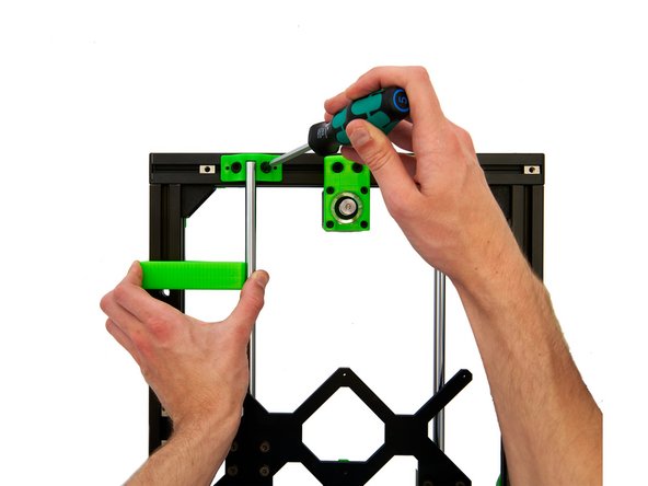 Then place the tool at the back on the left y-axis and press the bar against it here as well.