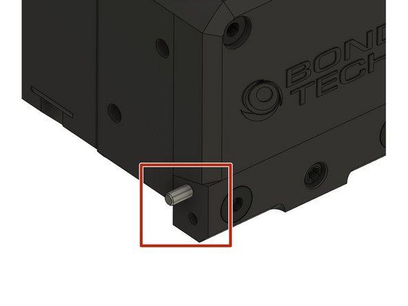 Insert the 10mm dowel pin on the left side (seen from the front) into the Copperhead holder.