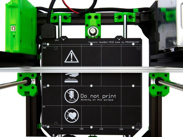 Press the selected object against the front of the z-profile and use the lines on the heatbed to check whether it is aligned straight.