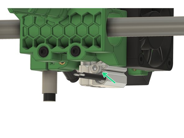 Insert the thermistor cartridge into the upper hole.