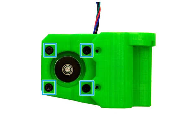 Insert 2x M3 Nuts into the bottom of the cable guide at the back of the x-motor holder.