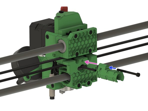 Route the cables for the fans, the PINDA, the filament sensor cable, and the extruder motor through the hole.