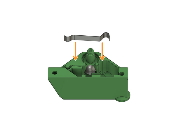 Drücken Sie die Feder, mithilfe des Schlitzschraubenziehers, vorsichtig in die Halterung.
